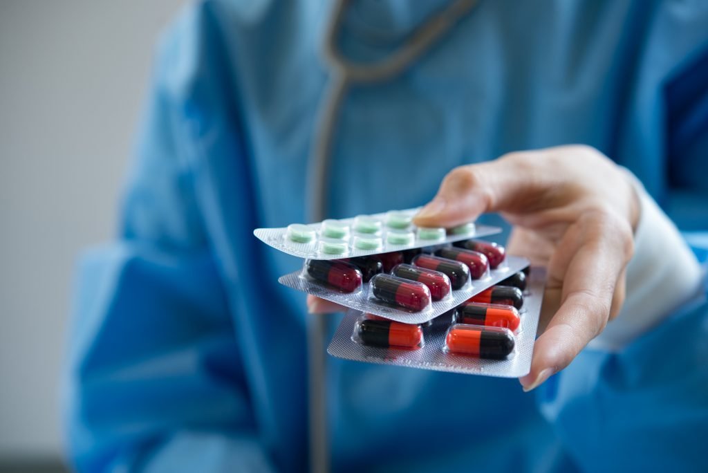 pharmacist holding